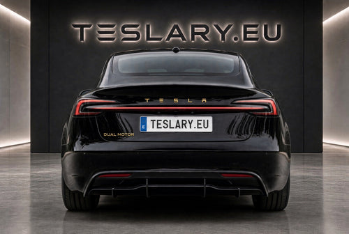 Rear view of a black Tesla Model S with a custom license plate reading TESLARY.EU, parked in front of a dark wall with large TESLARY. TESLA_MODEL_Y_JUNIPER_MODEL_3_HIGHLAND_DUAL_MOTOR_LOGOS_IN_BLACK_RED_GLOSS_MAT_GOLD_CHROME_PERFORMANCE_BUY_FROM_IRELAND_AND_EUROPES_TESLARY.EU
