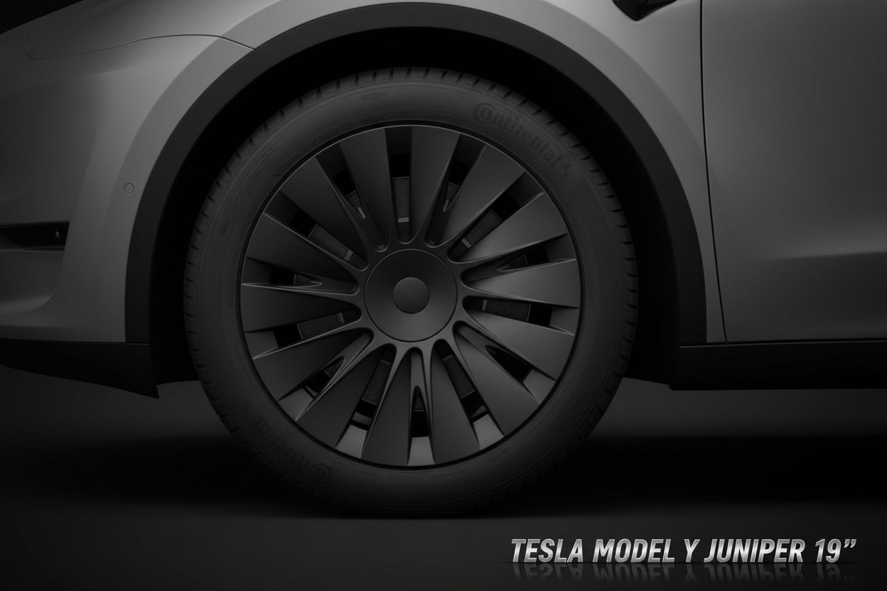 Gros plan sur une roue de voiture avec une jante et un pneu noirs.