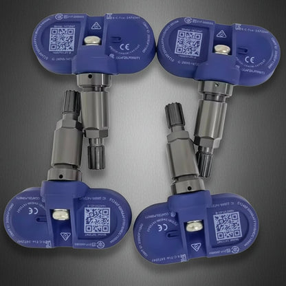 A blue and black Tesla wheel speed sensor adapter is shown against a dark gray background with promotional text reading 'EXTRA LONG LIFE BATTERY' and 'SUITABLE FOR TESLA MODEL 3, Y, S & X 2021 ONWARDS,' plus five Tesla cars along the bottom. TPMS Sensors for your Tesla Buy 3 and get 1 Free at Europes teslary.eu